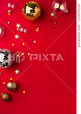 Christmas ornaments on a red background. 133076184