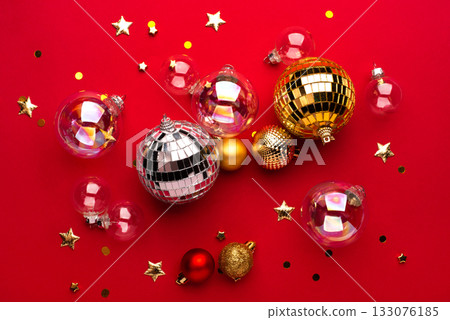 Christmas ornaments on a red background. Christmas ornaments on a red background. 133076185