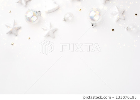 Christmas ornaments on a white background. Christmas ornaments on a white background. 133076193