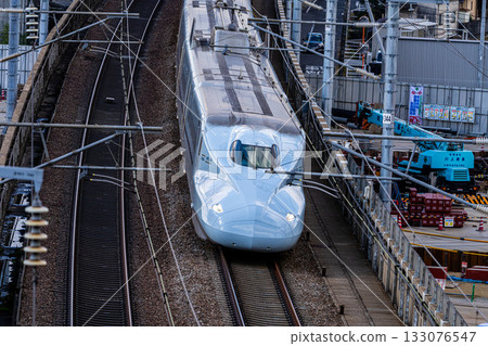 Kyushu Shinkansen Sakura bound for Shin-Osaka Station. Scenery seen from Shishikan Amusement Park in early winter. 7. Higashi Ward, Okayama City, Okayama Prefecture. 133076547