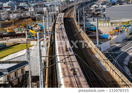 Nozomi Shinkansen bound for Hakata Station. Scenery seen from Shishikan Amusement Park in early winter. 6. Higashi Ward, Okayama City, Okayama Prefecture. 133076555