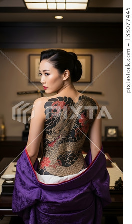 A female gangster with a dragon tattoo covering her entire back 133077445