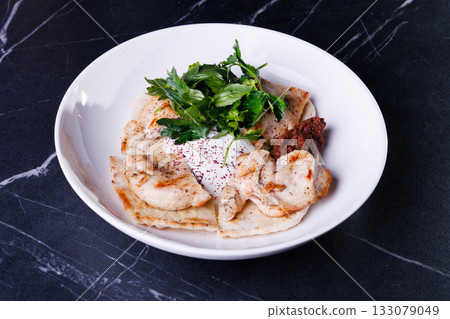Creamy Chicken Flatbread Plate With Yogurt Sauce, Parsley Creamy Chicken Flatbread Plate With Yogurt Sauce, Parsley 133079049