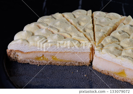 Lemon Cheesecake With Fluffy Meringue Topping Lemon Cheesecake With Fluffy Meringue Topping 133079072