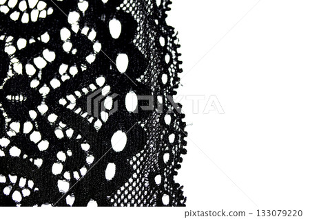 Close up of pretty crochet lace on a white background Close up of pretty crochet lace on a white background 133079220