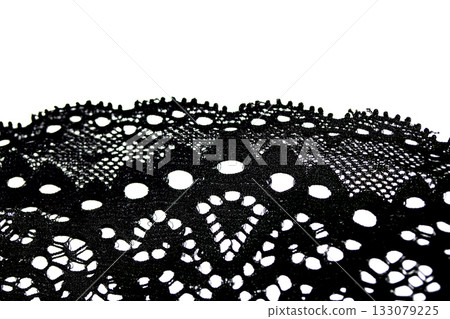 Close up of pretty crochet lace on a white background 133079225