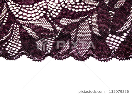 Close up of pretty crochet lace on a white background Close up of pretty crochet lace on a white background 133079226