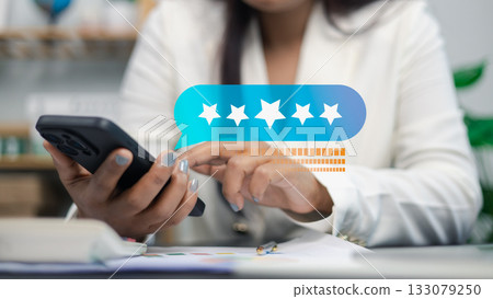 Customer Review and Five-Star Rating Feedback on Smartphone Interface 133079250
