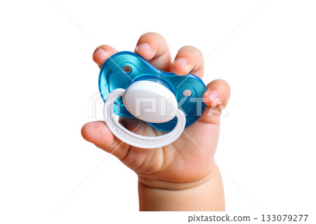 Newborn baby's small hand holding single blue pacifier, symbolizing infancy, parenthood isolated on transparent background Newborn baby's small hand holding single blue pacifier, symbolizing infancy, parenthood isolated on transparent background 133079277