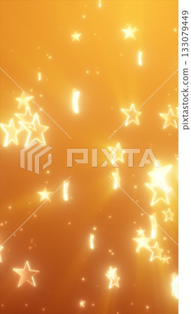 Glowing golden stars falling gently across a radiant orange background with festive light effects 133079449