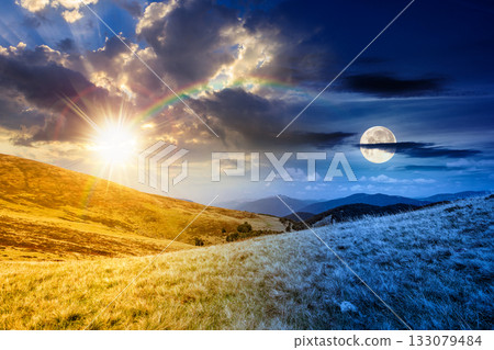 landscape with grassy meadow of ridge. day and night time change concept. mountain scenery on summer solstice with sun and moon at twilight. travel background. nature duality and transition template landscape with grassy meadow of ridge. day and night time change concept. mountain scenery on summer solstice with sun and moon at twilight. travel background. nature duality and transition template 133079484
