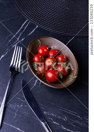 Fresh Red Tomatoes in a Rustic Bowl Garnished with Dill Fresh Red Tomatoes in a Rustic Bowl Garnished with Dill 133080259