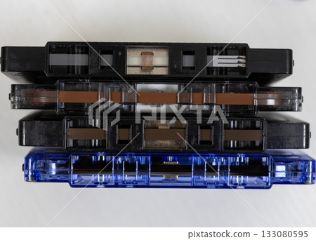 Various vintage audio cassettes isolated on background 133080595