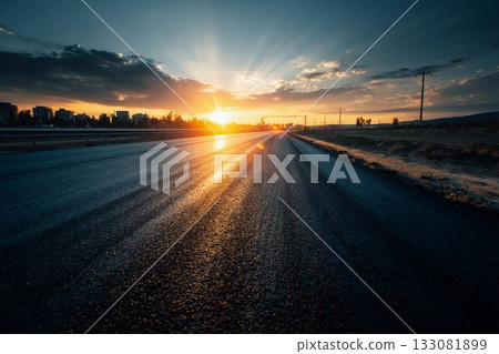 Stunning Sunset Over Freshly Paved Asphalt Road With City Skyline in View Generative AI Stunning Sunset Over Freshly Paved Asphalt Road With City Skyline in View Generative AI 133081899