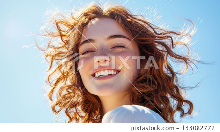 Carefree Woman Smiling in the Sunlight 133082772