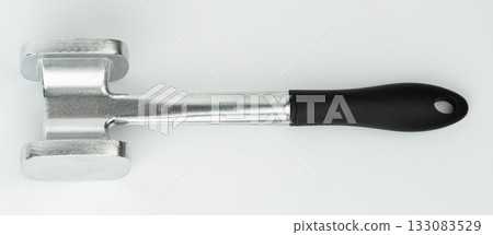 Heavy metal mallet with black handle for cooking tasks 133083529