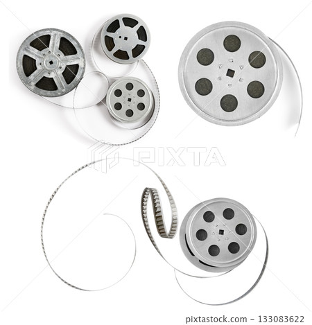 Set of Vintage Silver Film Reels and Celluloid Tape on Clean White Background 133083622