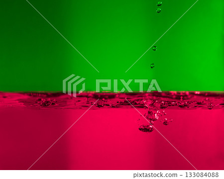 405.Water Droplets Splashing With Green And Pink Colors 405.Water Droplets Splashing With Green And Pink Colors 133084088