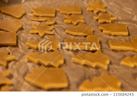 Gingerbread Shapes Prepared for Baking During a Festive Christmas Celebration 133084243