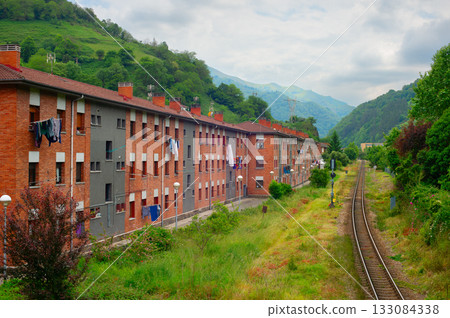 apartment building railroad track Spain 133084338