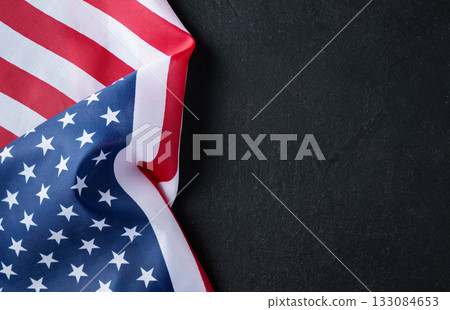 American flag on black background, perfect for national celebration designs, promotional materials, and patriotic marketing campaigns. Veterans Day background. American flag on black background, perfect for national celebration designs, promotional materials, and patriotic marketing campaigns. Veterans Day background. 133084653