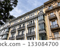 Elegant residential buildings in Castellana, Madrid, showcasing architectural details. 133084700