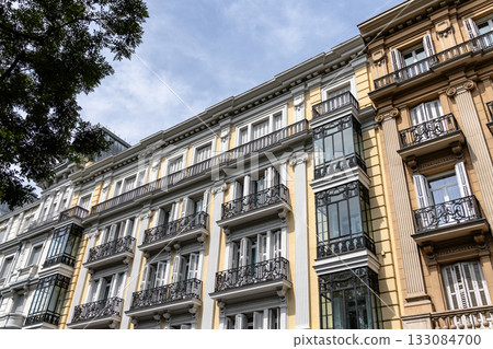 Elegant residential buildings in Castellana, Madrid, showcasing architectural details. Elegant residential buildings in Castellana, Madrid, showcasing architectural details. 133084700