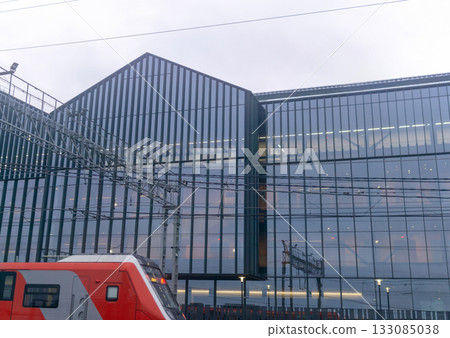 Modern high-speed train on a background of the modern building. 133085038