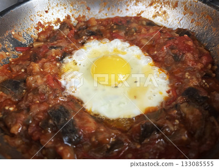 Shakshouka tunisian egg breakfast close up 133085555