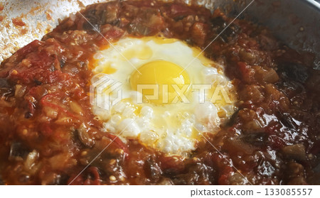 Shakshouka tunisian egg breakfast close up 133085557