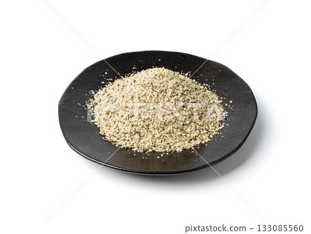 Shelled hemp seeds pile isolated, peeled cannabis grains, marijuana kernels without peel Shelled hemp seeds pile isolated, peeled cannabis grains, marijuana kernels without peel 133085560