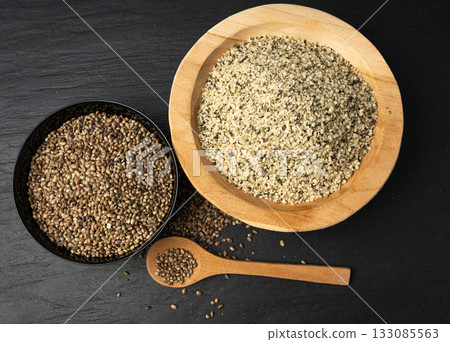 Shelled hemp seeds pile, peeled cannabis grains, marijuana kernels without peel Shelled hemp seeds pile, peeled cannabis grains, marijuana kernels without peel 133085563