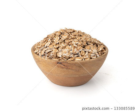Spelt flakes isolated, dry raw rolled flat oat grains, wheat, oatmeal or bran, barley rye cereals 133085589