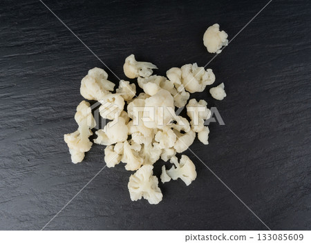 Steamed cauliflower pieces close up Steamed cauliflower pieces close up 133085609