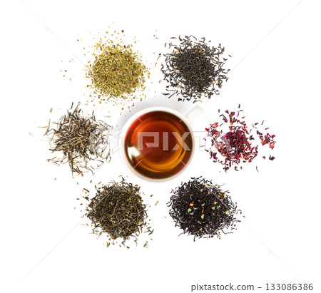 Herbal leaves and tea cup isolated. Green, black tea dry ingredient set, fruit and herbal drink mix 133086386