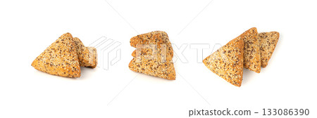 Triangular bun with sesame and flax seeds Triangular bun with sesame and flax seeds 133086390