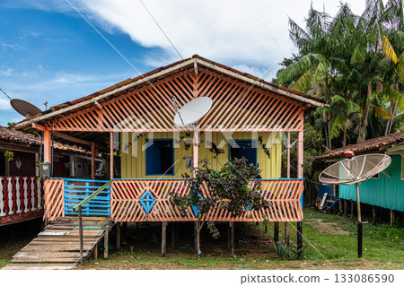 Colorful natural-framed houses with balconies at Pesqueiro, Soure in Marajo Island, Brazil. 133086590