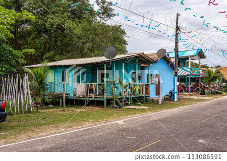 Colorful natural-framed houses with balconies at Pesqueiro, Soure in Marajo Island, Brazil. 133086591