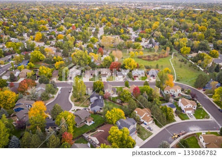 dawn over residential streets of Fort Collins in northern Colorado, early fall sunrise aerial scenery dawn over residential streets of Fort Collins in northern Colorado, early fall sunrise aerial scenery 133086782