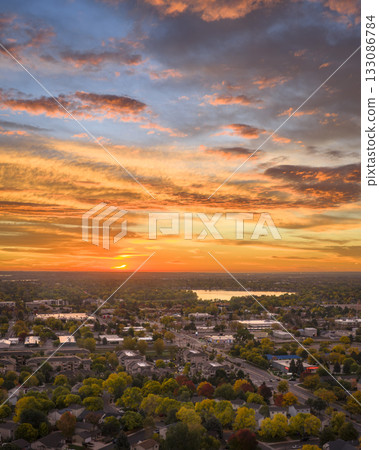 dramatic sunrise over midtown of Fort Collins and plains in northern Colorado, aerial view dramatic sunrise over midtown of Fort Collins and plains in northern Colorado, aerial view 133086784