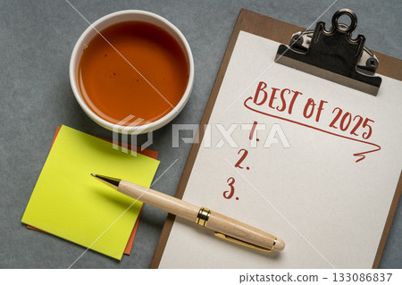 best of 2025 - blank list on a clipboard, flat lay with a cup of tea, product or business review of the recent year best of 2025 - blank list on a clipboard, flat lay with a cup of tea, product or business review of the recent year 133086837