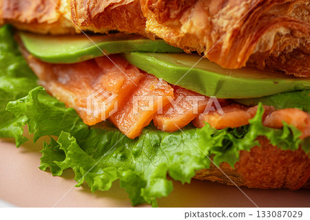 Croissant with salmon and avocado Croissant with salmon and avocado 133087029