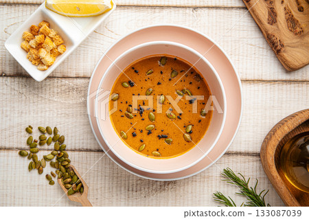 Lentil soup with seeds and croutons Lentil soup with seeds and croutons 133087039