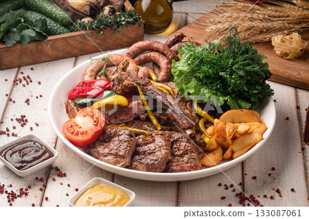 Assorted mixed grilled meat platter Assorted mixed grilled meat platter 133087061