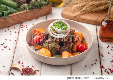 Fried meat with potatoes and onions Fried meat with potatoes and onions 133087070