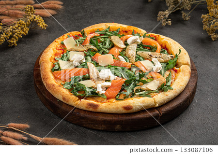 Gourmet pizza with salmon and arugula Gourmet pizza with salmon and arugula 133087106