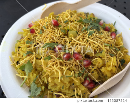 Poha Indian breakfast food. Healthy pohe rice flakes dish 133087214