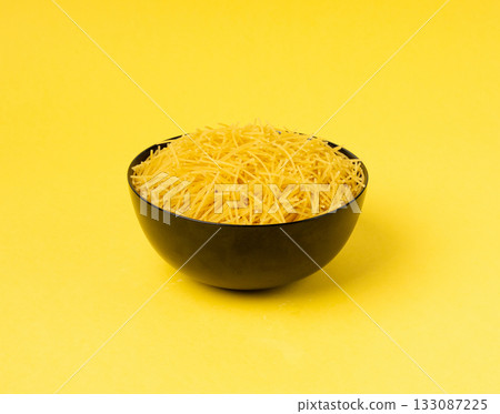 Raw vermicelli, gold soup pasta, small homemade noodles, thin Italy macaroni Raw vermicelli, gold soup pasta, small homemade noodles, thin Italy macaroni 133087225