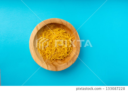 Raw vermicelli, gold soup pasta, small homemade noodles, thin Italy macaroni 133087228