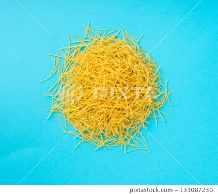 Raw vermicelli, gold soup pasta, small homemade noodles, thin Italy macaroni Raw vermicelli, gold soup pasta, small homemade noodles, thin Italy macaroni 133087230